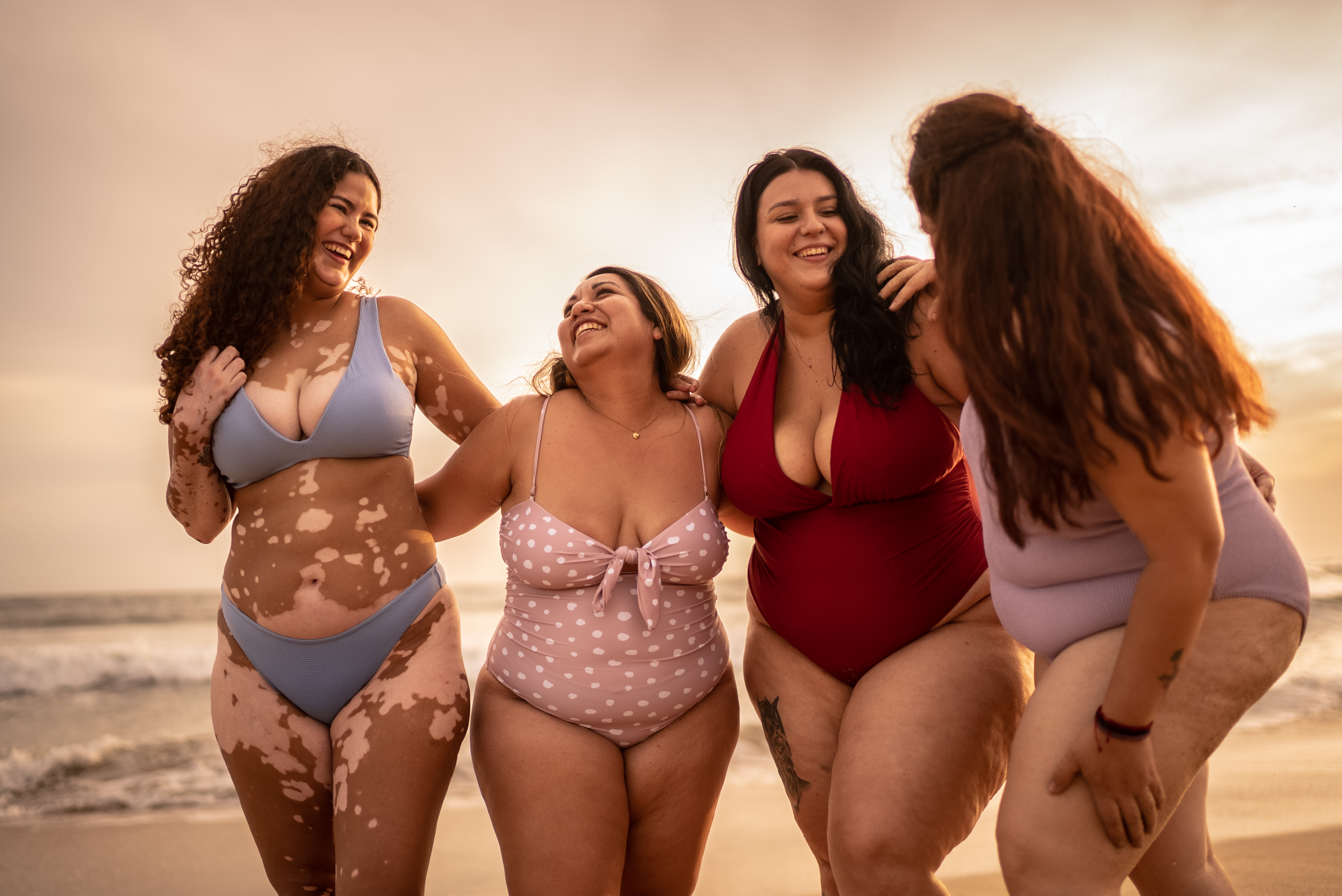 body_positive.jpg?auto=format%2Ccompress&crop=faces&cs=tinysrgb&fit=crop&h=501&w=890