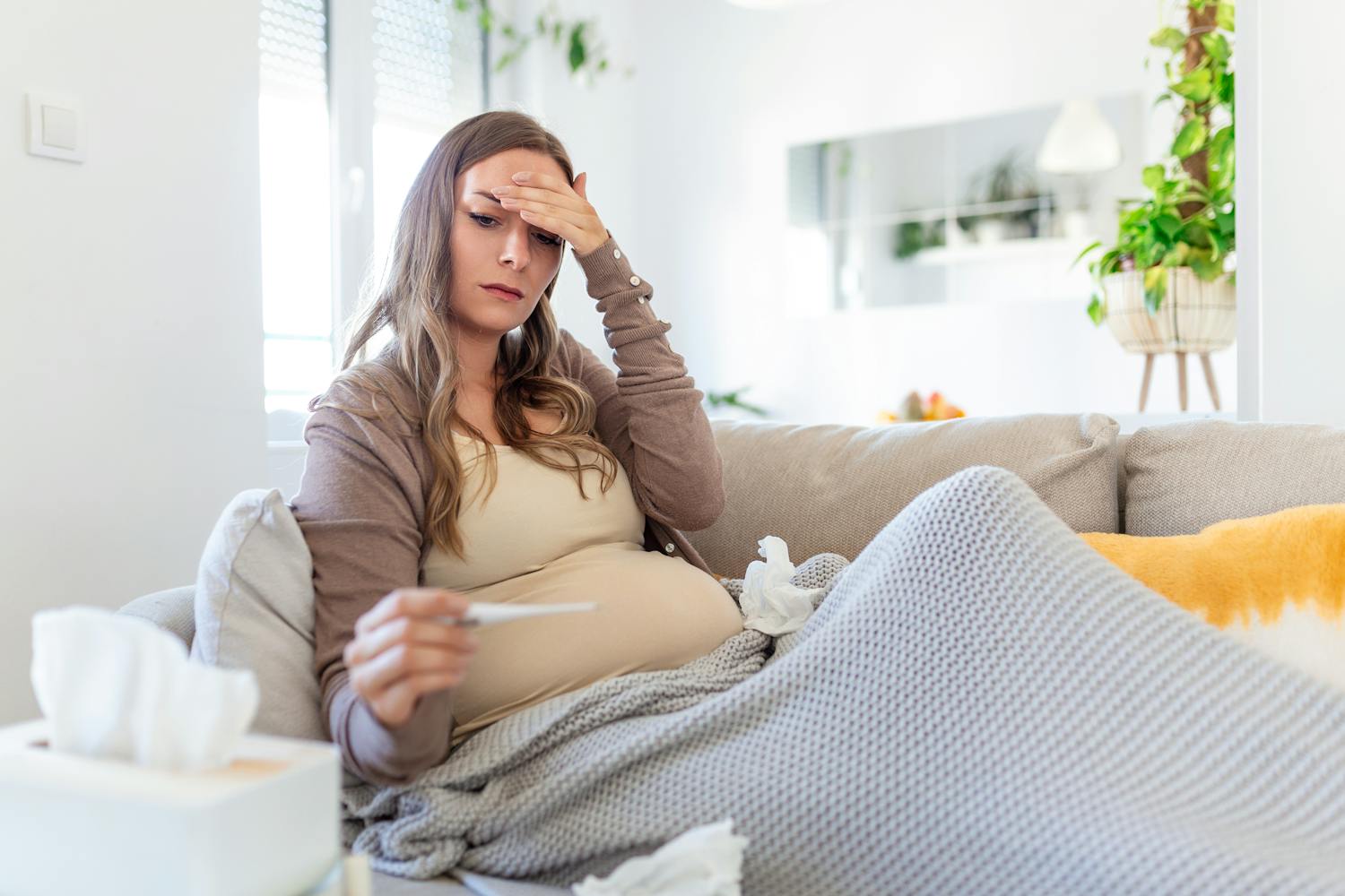 La grippe chez la femme enceinte : que faire, quels risques ?